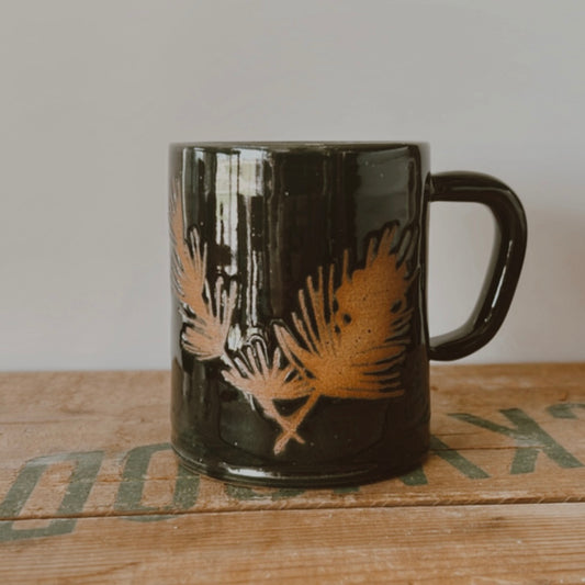 Winter Pine Boughs Mug in Black, Deep Evergreen, and Sand and Sage Glaze