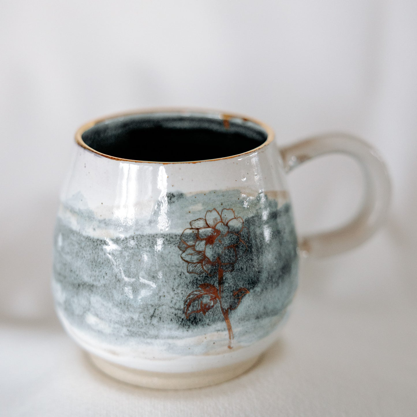 Teal and White Pottery Mug with a Gold Flower Decal