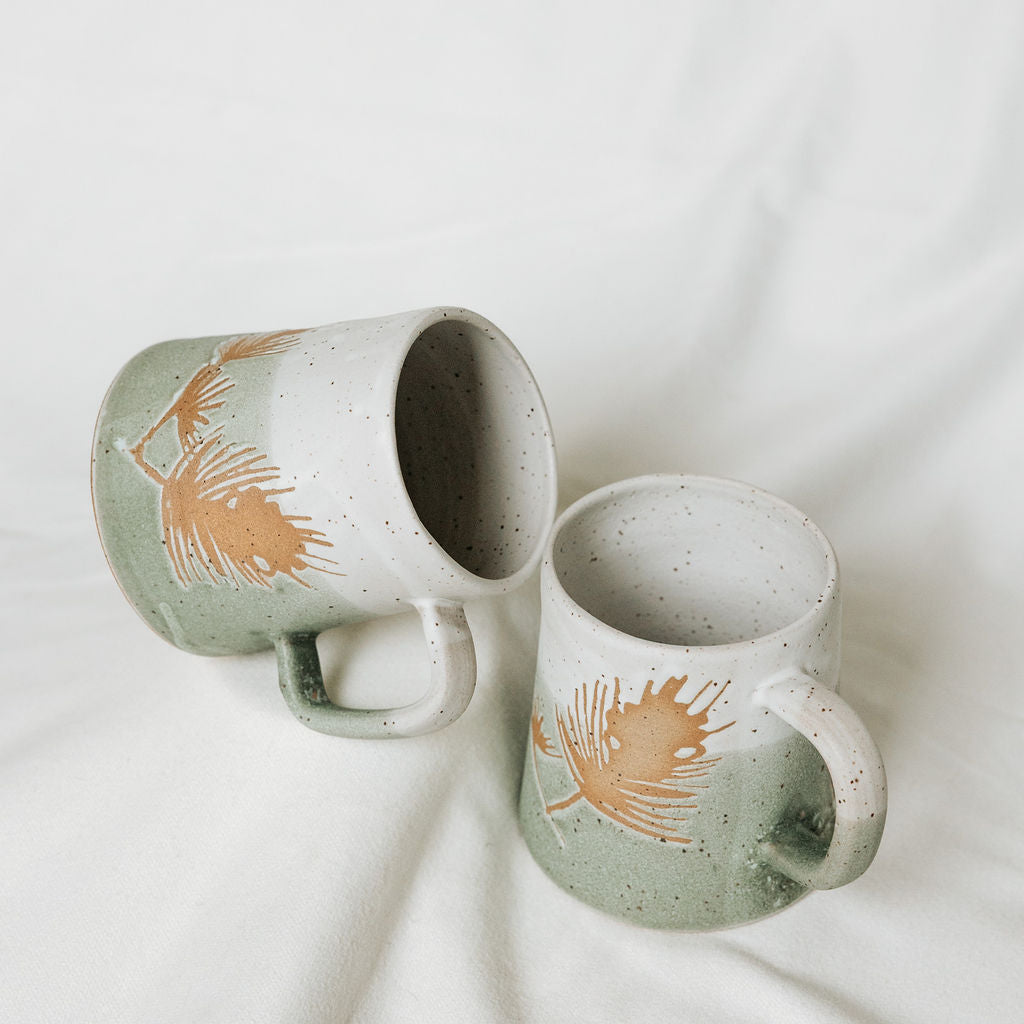 Winter Pine Boughs Mug in Black, Deep Evergreen, and Sand and Sage Glaze