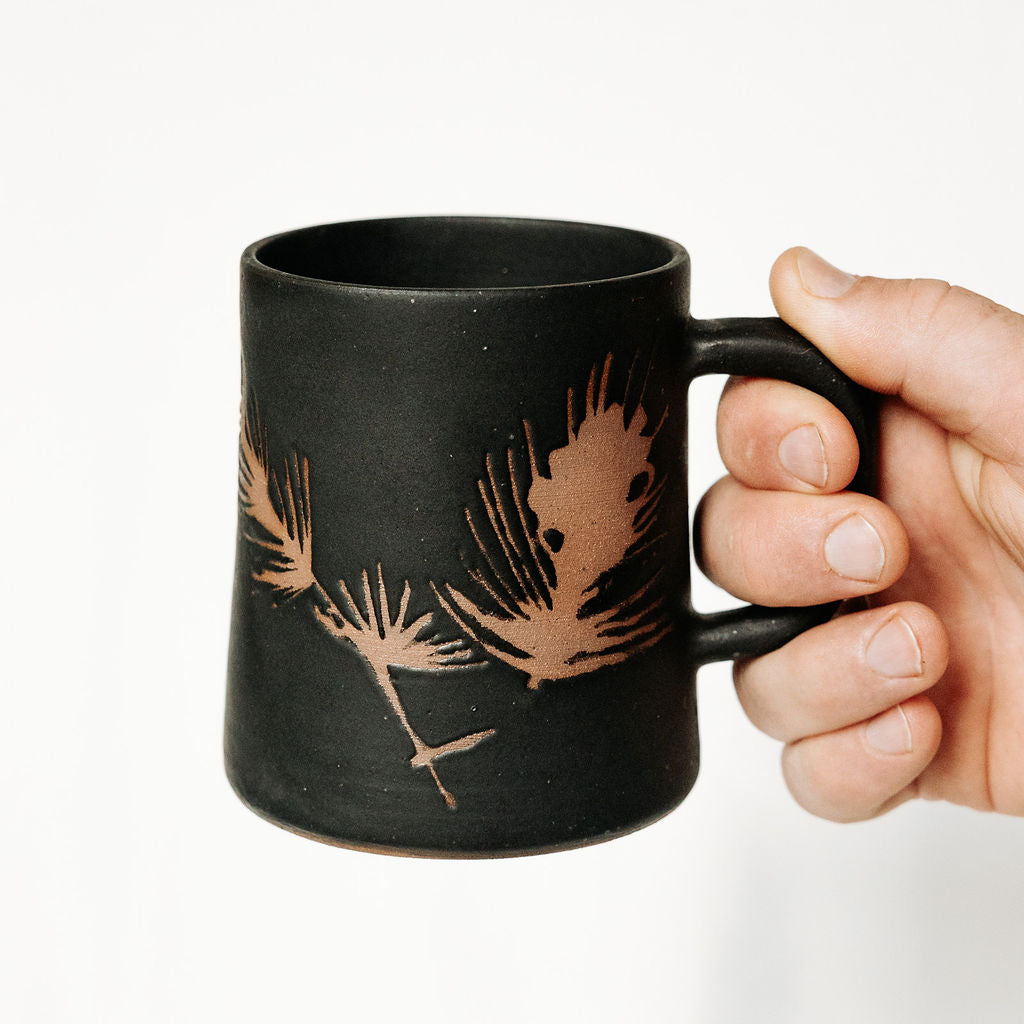 Winter Pine Boughs Mug in Black, Deep Evergreen, and Sand and Sage Glaze