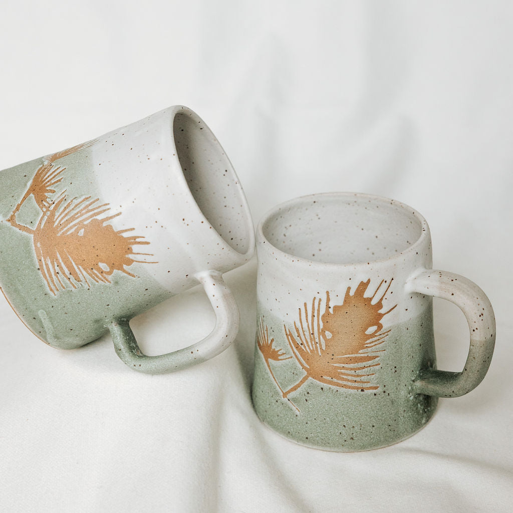 Winter Pine Boughs Mug in Black, Deep Evergreen, and Sand and Sage Glaze