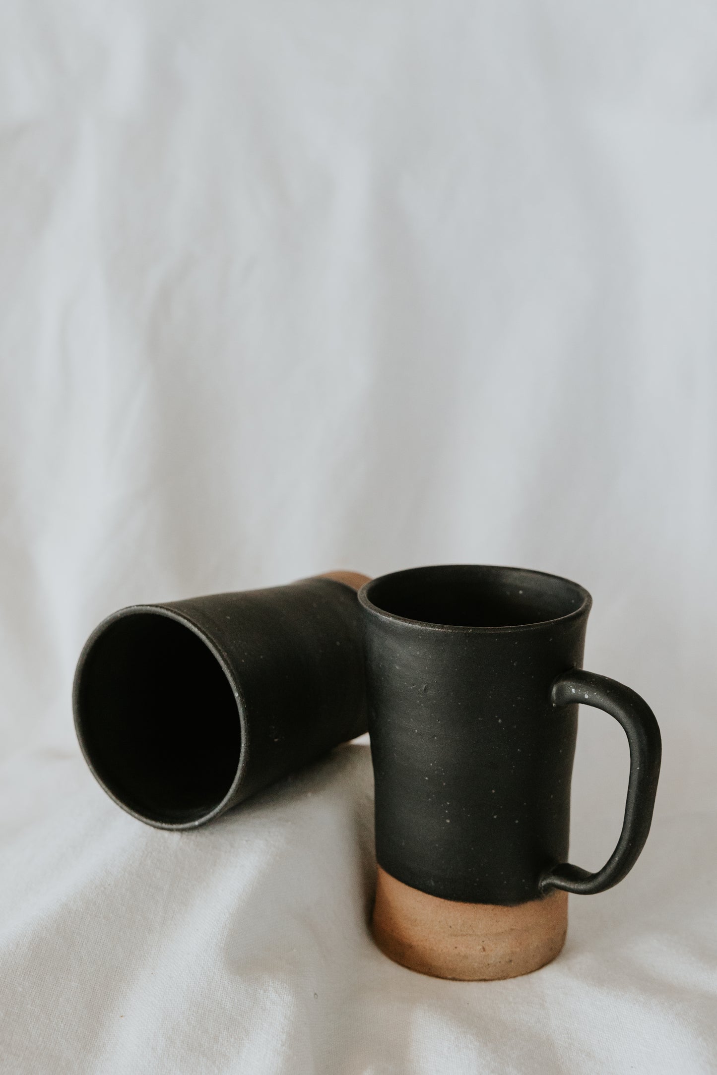 Speckled Black Organic Pottery Mug with Brown Bottom