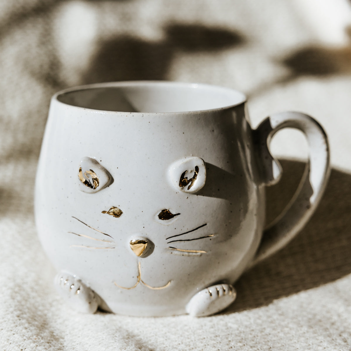 White Meow Cat Pottery Mug with Cochlear Implant