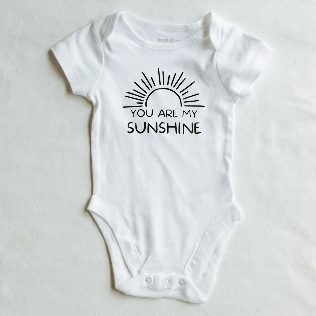 Printed Baby Onesies by The Small Ones Boutique